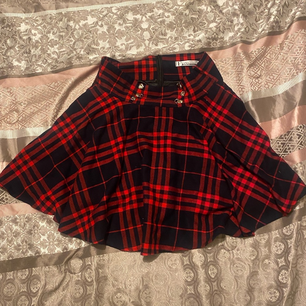 Red and black plaid skirt knee high.